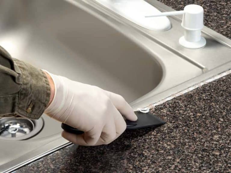 remove mold under caulk by kitchen sink