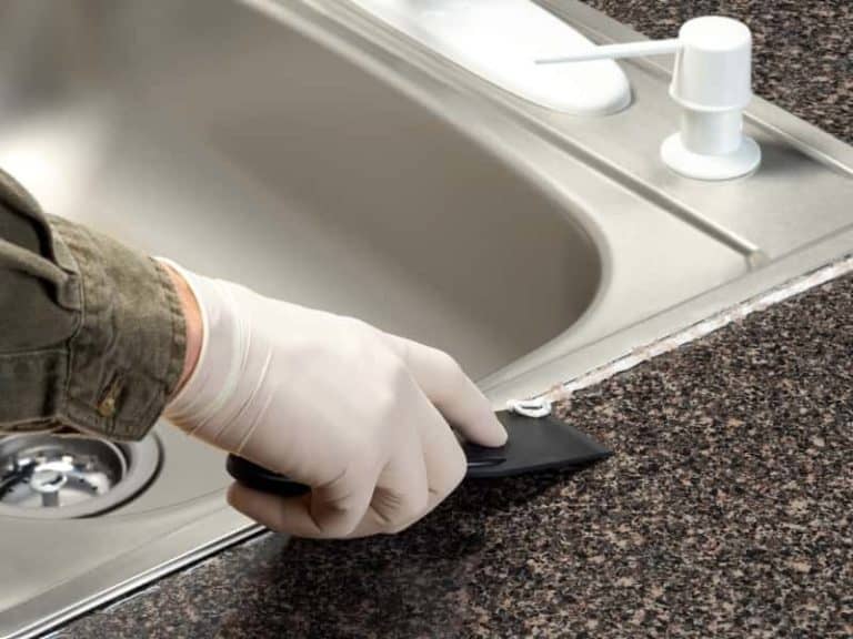 should i caulk around a stainless steel kitchen sink