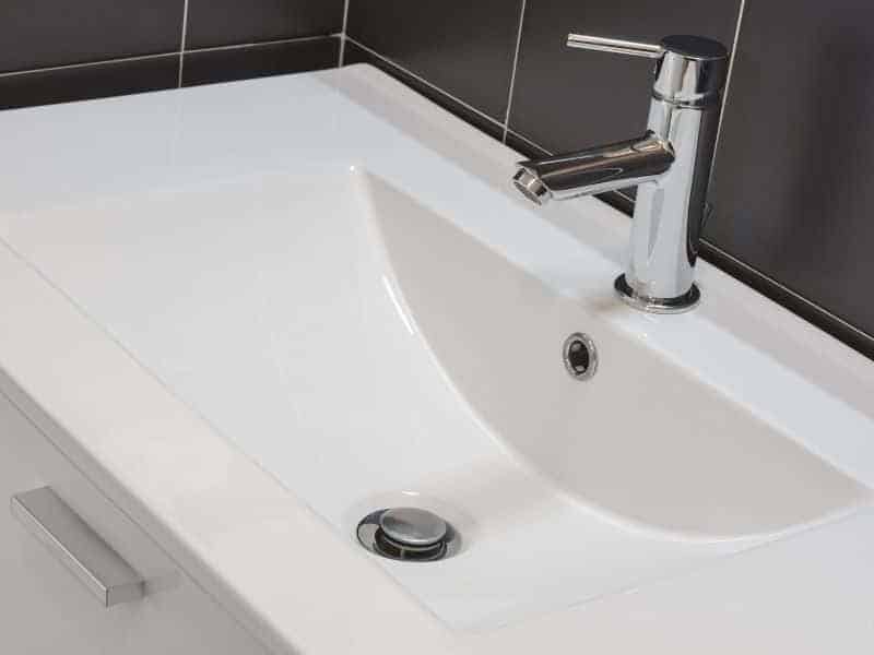 swanstone bathroom sink drain size
