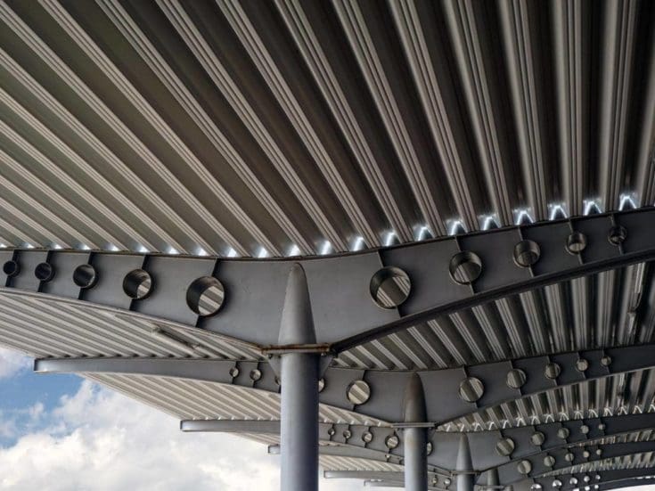 How Much Should a Metal Roof Overhang? Should It Drip Edge?