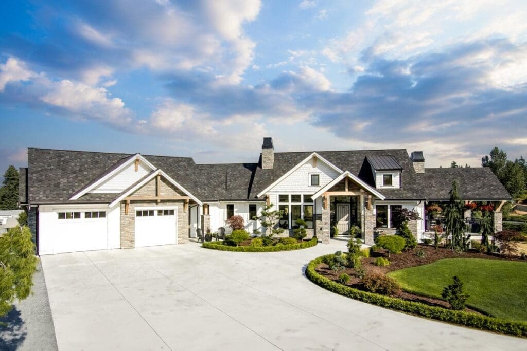 5-Bedroom 1-Story Modern Farmhouse with Angled and Lower Level Garages (Floor Plan)